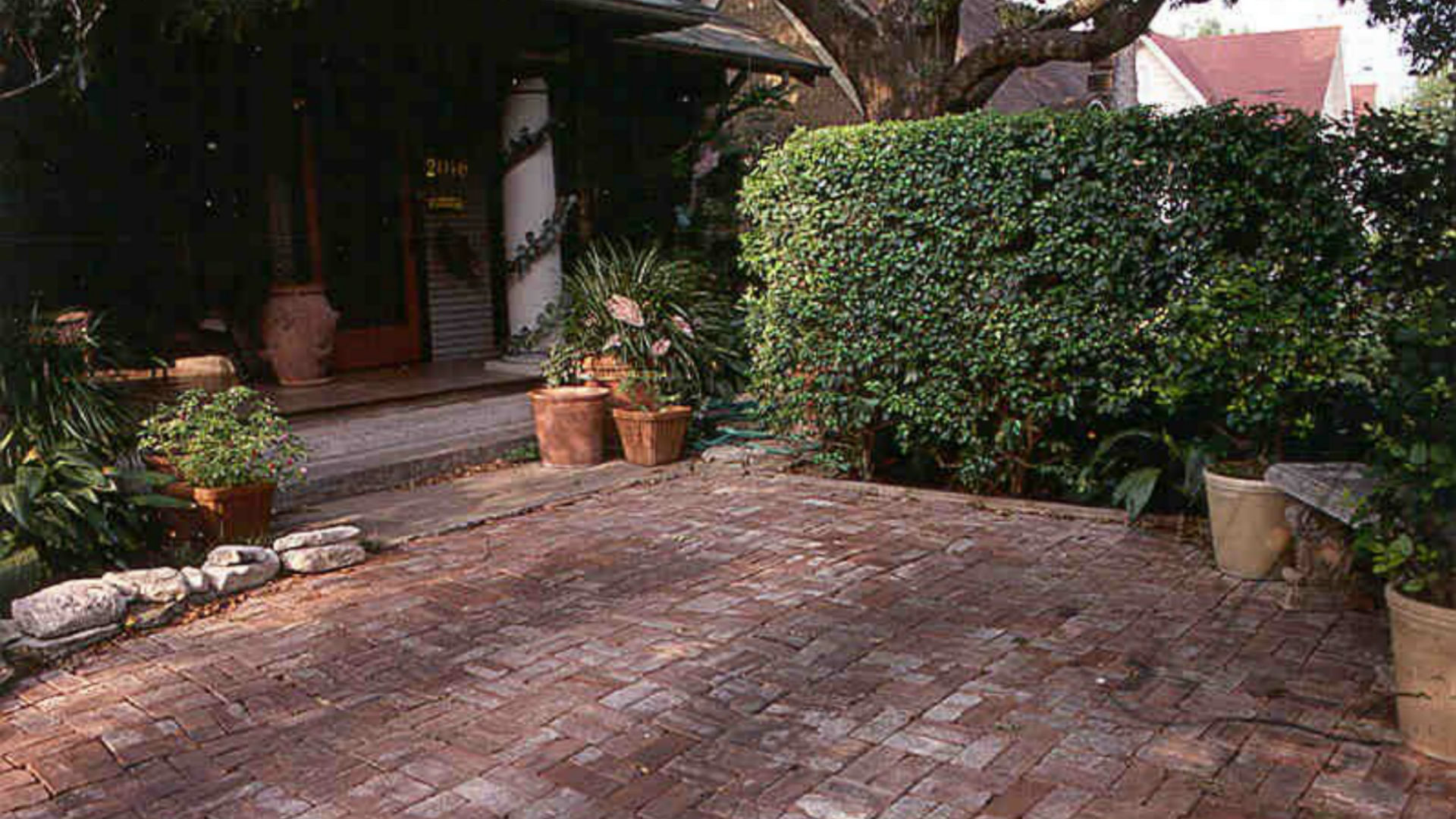 A brick patio assembled by hand (without mortar) is a craft.