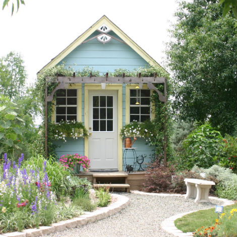 A cottage garden makes room for abundant variety of blooming plants.