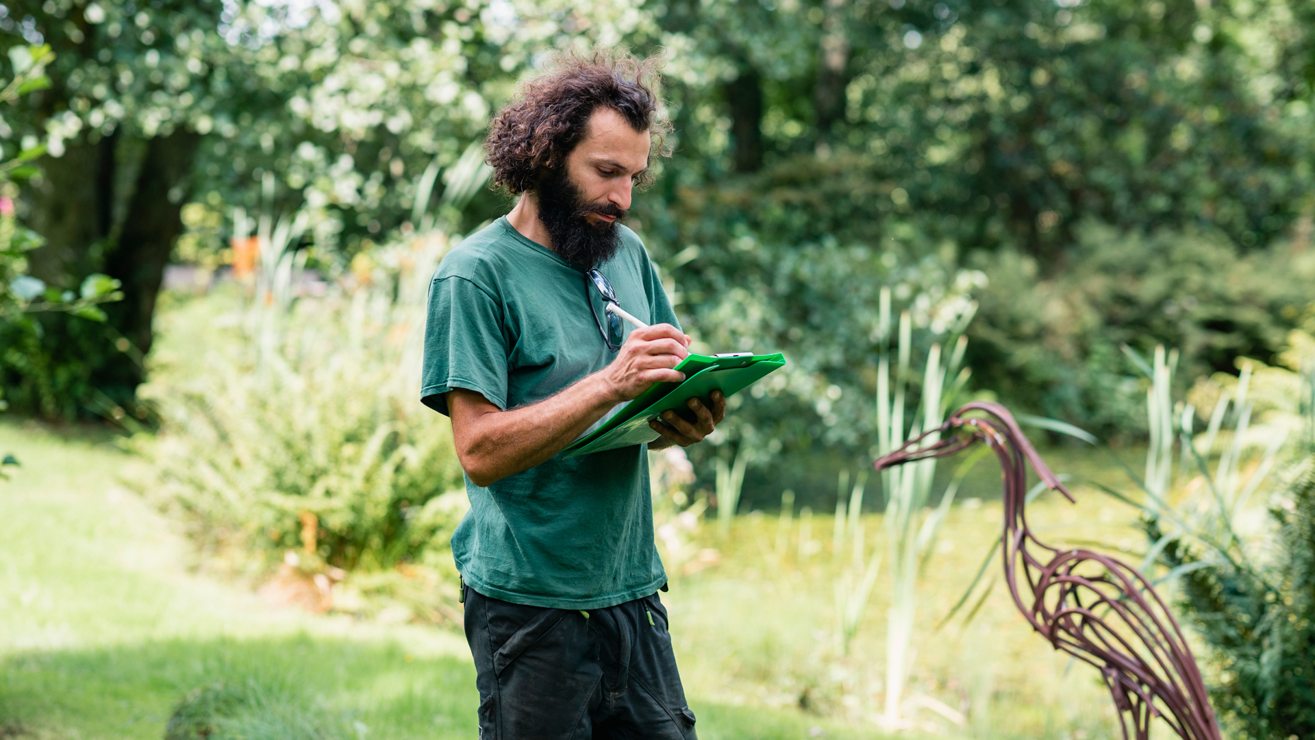 landscaper making notes