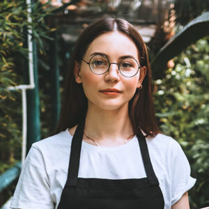 woman in greenhouse photo