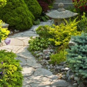 Picture of a garden pathway lined with stones.